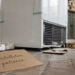 Installation frigo : réglage des pieds pour une pose stable et anti-panne
