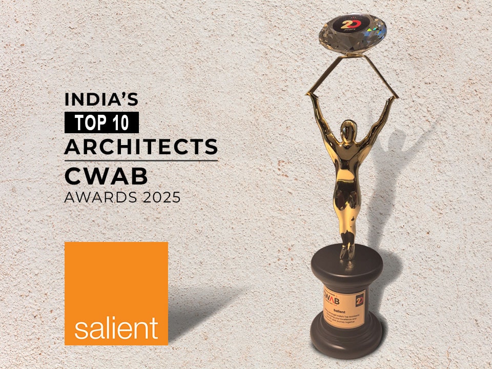 Elegant architectural award trophy with a golden human figure holding a diamond-shaped top, celebrating top architects in India.