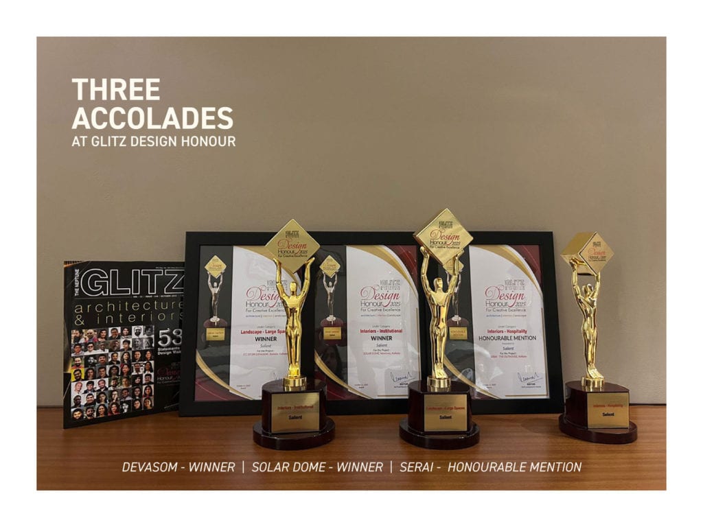 Elegant award trophies and framed accolades from Glitz Design Honour showcased at Salient Design Studio.