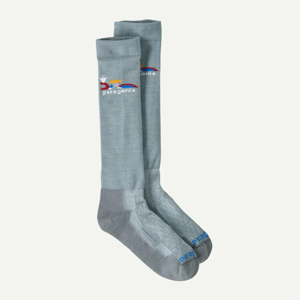 A product image for a pair of merino wool thermal socks in adult sizes from the brand Patagonia. Clicking this image will take you to the product page
