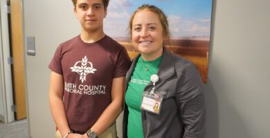Thunder Ridge senior Michael Ferguson poses with Smith County Family Practice provider, Jill Kuhlmann, APRN