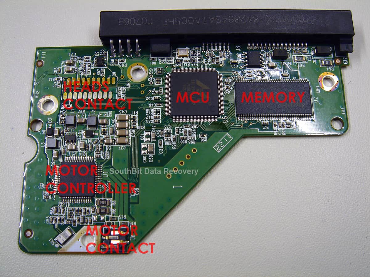 Inside of a Western Digital PCB showing MCU, motor controller, cache and ROM chips