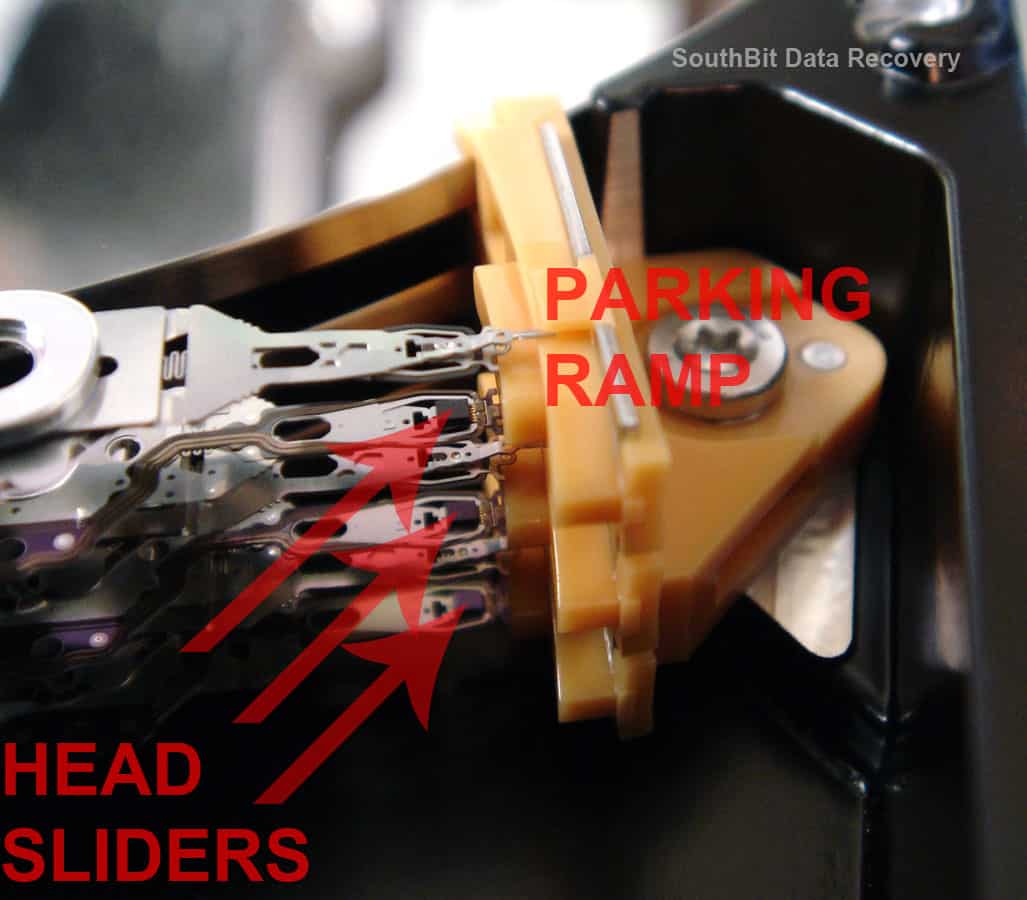 Hard drive head sliders at the end of the HSA arms