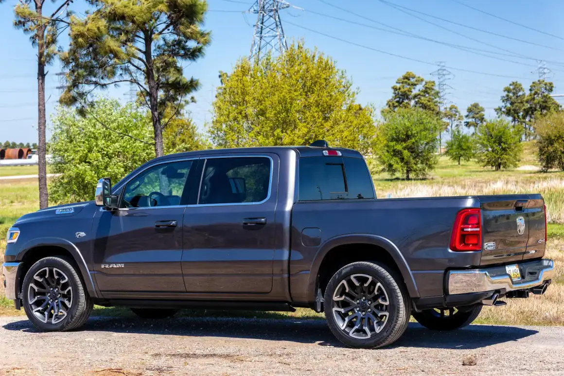 Ram 1500 Limited Longhorn pickup truck in a scenic outdoor setting.