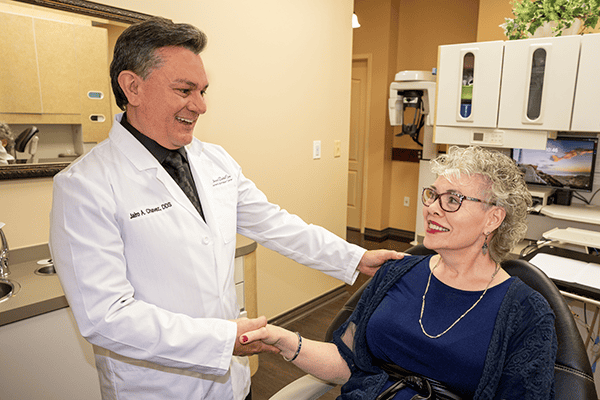 Dr. Chavez shakes hands with a patient