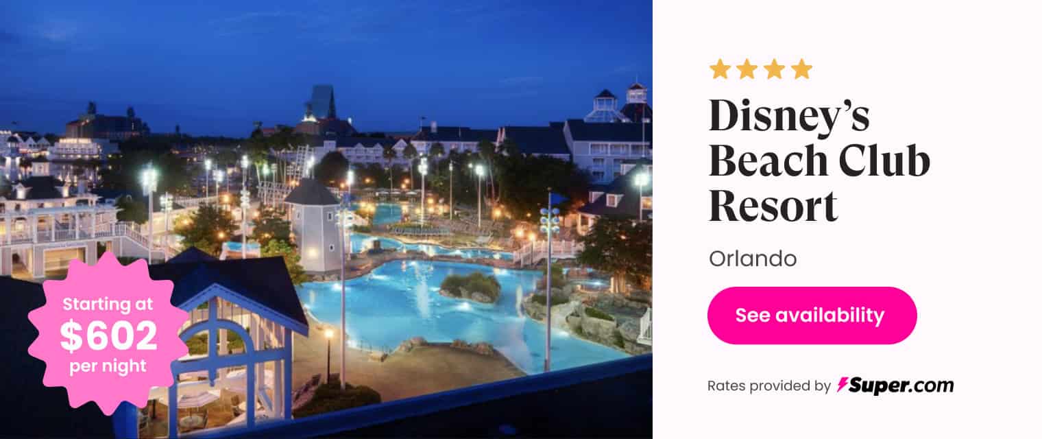 Luxurious Disney’s Beach Club Resort at night with glowing pools and hotel lights, Orlando vacation accommodation.