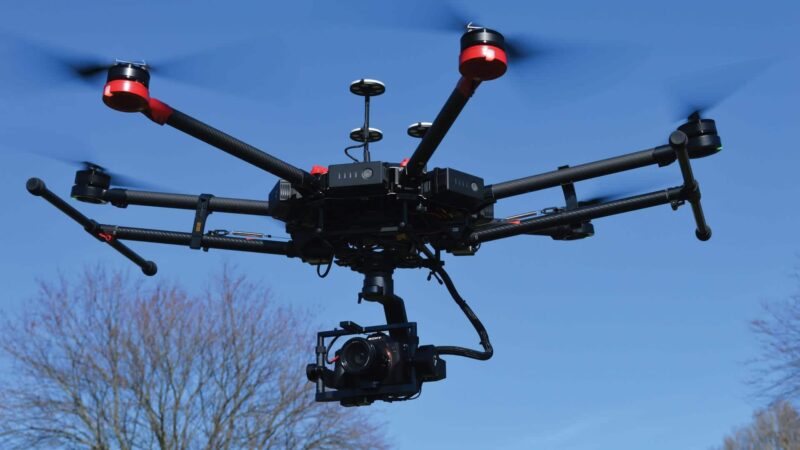 Drone in flight conducting a drone survey