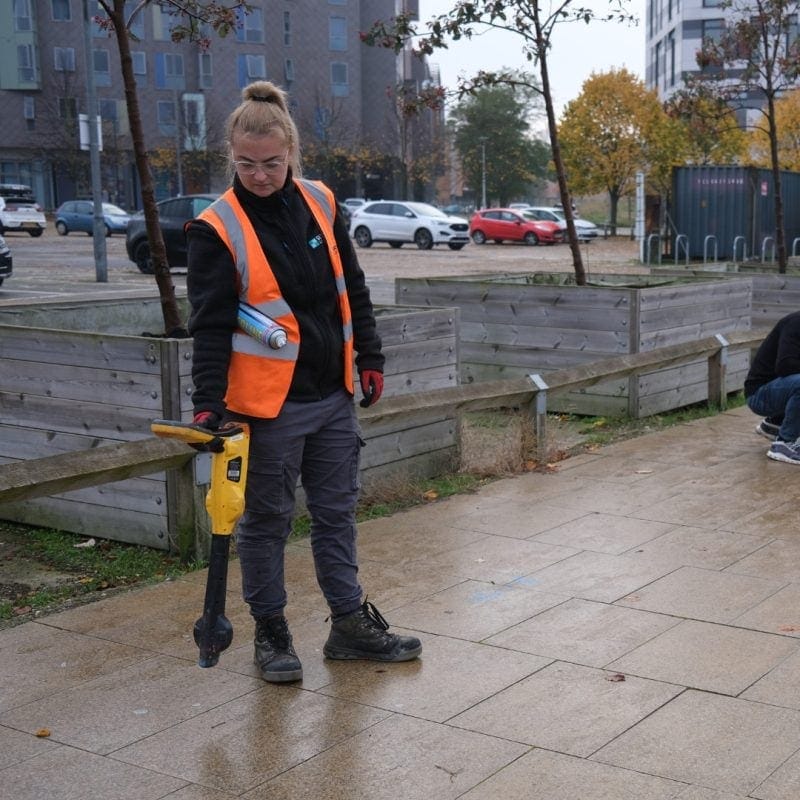 Photo of Erin conducting a utility survey