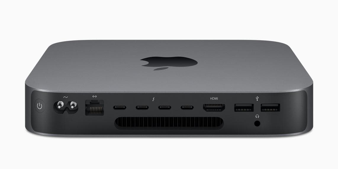 Επεξεργαστής Mac Mini με πολλές θύρες και λειτουργίες, σε γκρι χρώμα.