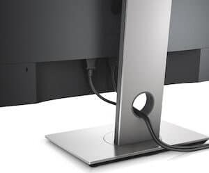 Πλαϊνή άποψη, τμήμα οθόνης υπολογιστή με βάση και καλώδια, σε μαύρο και ασημί χρώμα.