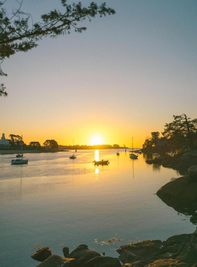 illustrative image of a weekend getaway idea: toes in the water