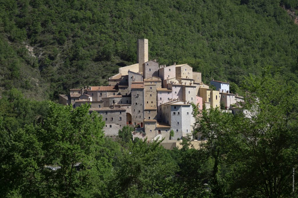 Journey Through the Green Heart of Italy: An Itinerary to Discover Umbria view of the small italian village of castello di postignano, the fourth stop on teritoria's journey through umbria.