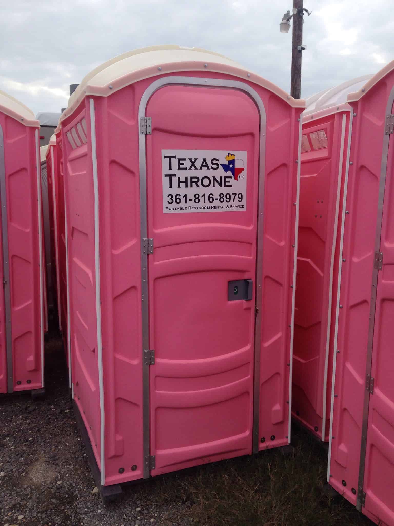 Portable pink restroom trailer for events and outdoor use | Texas Throne portable restrooms.