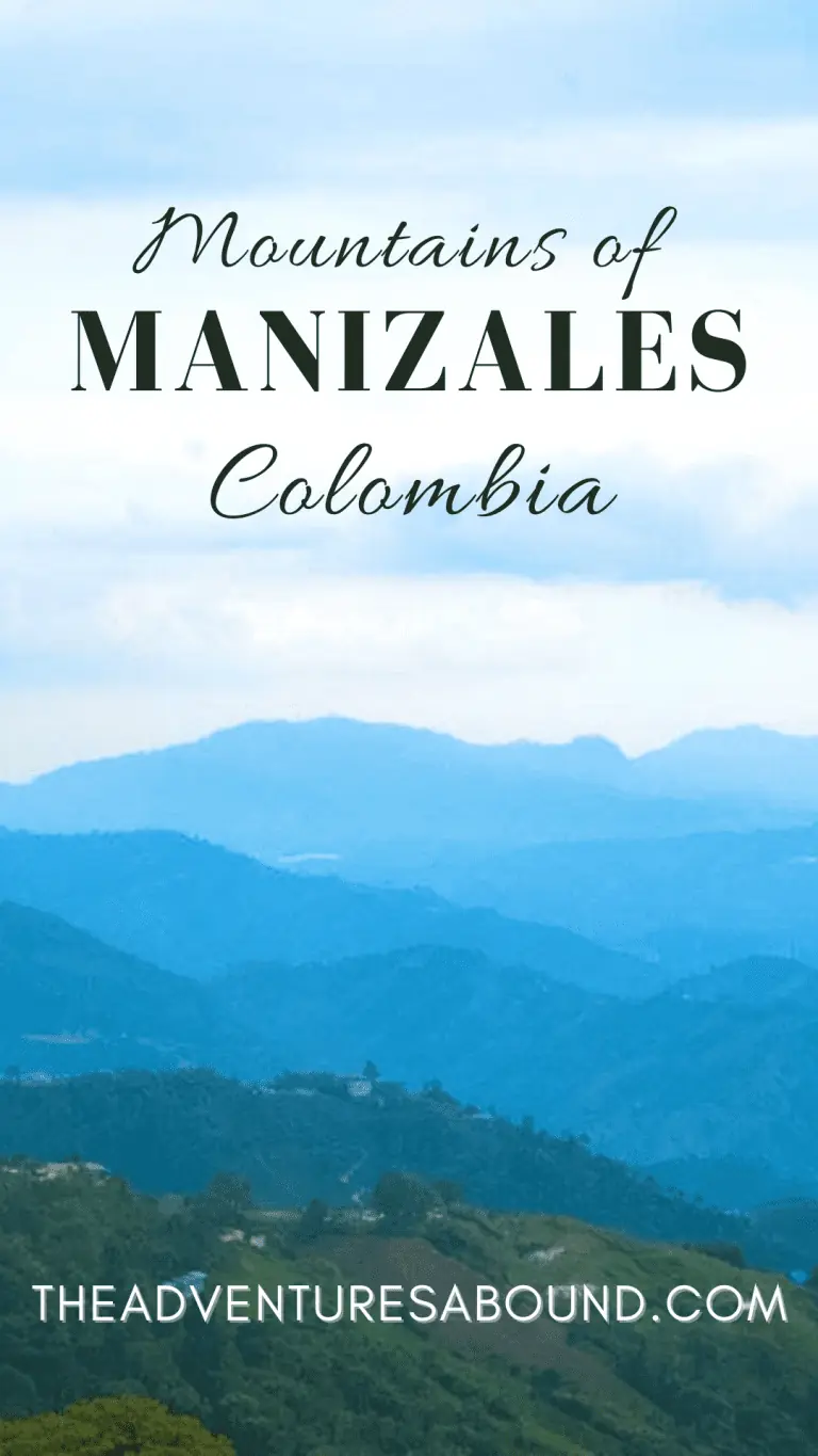 Pinterest image featuring the layered blue mountains of Manizales, Colombia with a clear sky background. Text overlaid reads 'Mountains of MANIZALES Colombia' at the top and 'THEADVENTURESABOUND.COM' at the bottom, suggesting travel content related to things to do in Manizales