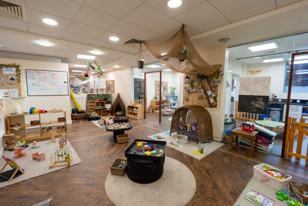 An inviting indoor play area at Holyrood Nursery Princes Dock, featuring toys, books, and creative spaces designed for early childhood development and fun.