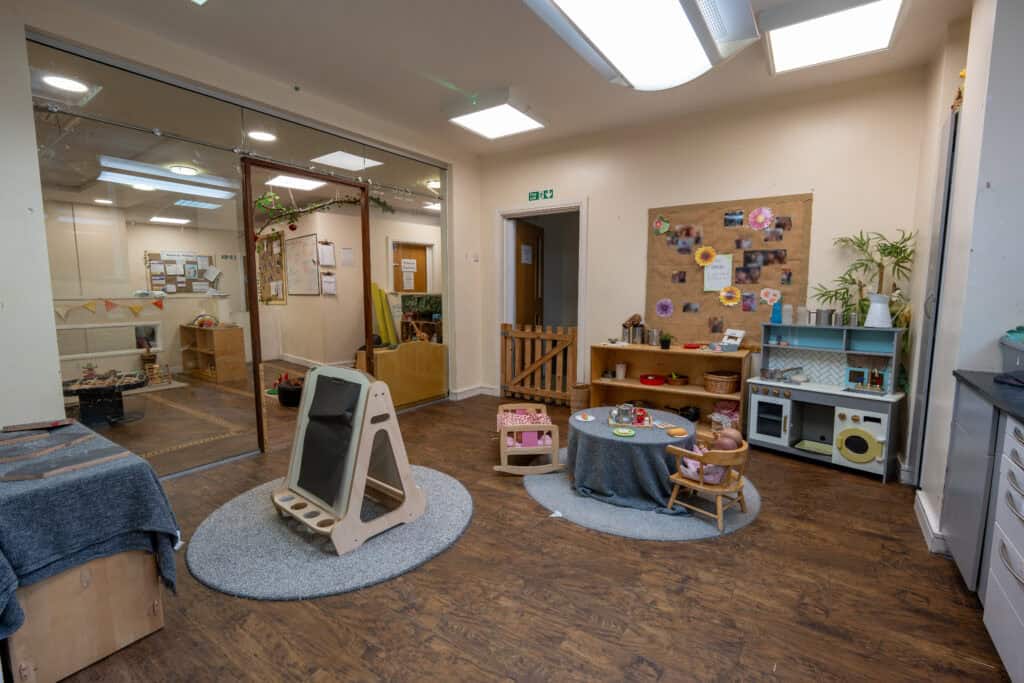 Bright indoor play area at Holyrood Nursery Princes Dock, with educational toys, comfortable seating, and engaging activities designed for early childhood development.