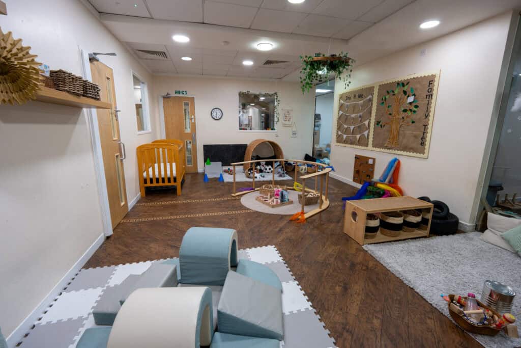 Bright and welcoming nursery play area at Holyrood Nursery Princes Dock, featuring soft play equipment, educational toys, and comfortable spaces for early childhood development.