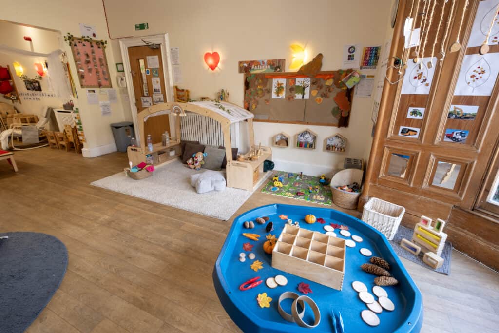 Bright interior of Thrive Childcare with engaging toys and activities for children's learning and development, showcasing a warm, safe environment for early childhood education and care.