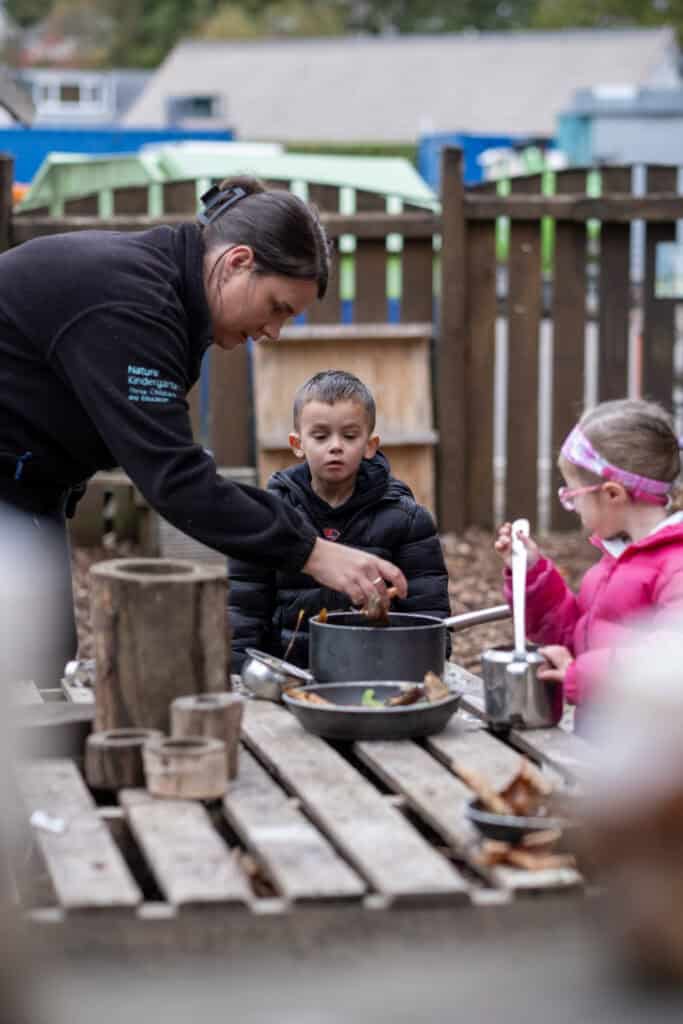 Cooking outdoor activities at Thrive Childcare, fostering nature-based learning and child development in a supportive environment.