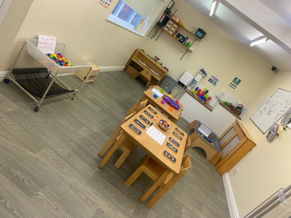 Play area with educational toys and activity stations at Holyrood Nursery Swinton. A safe, engaging environment designed for early childhood development and learning.