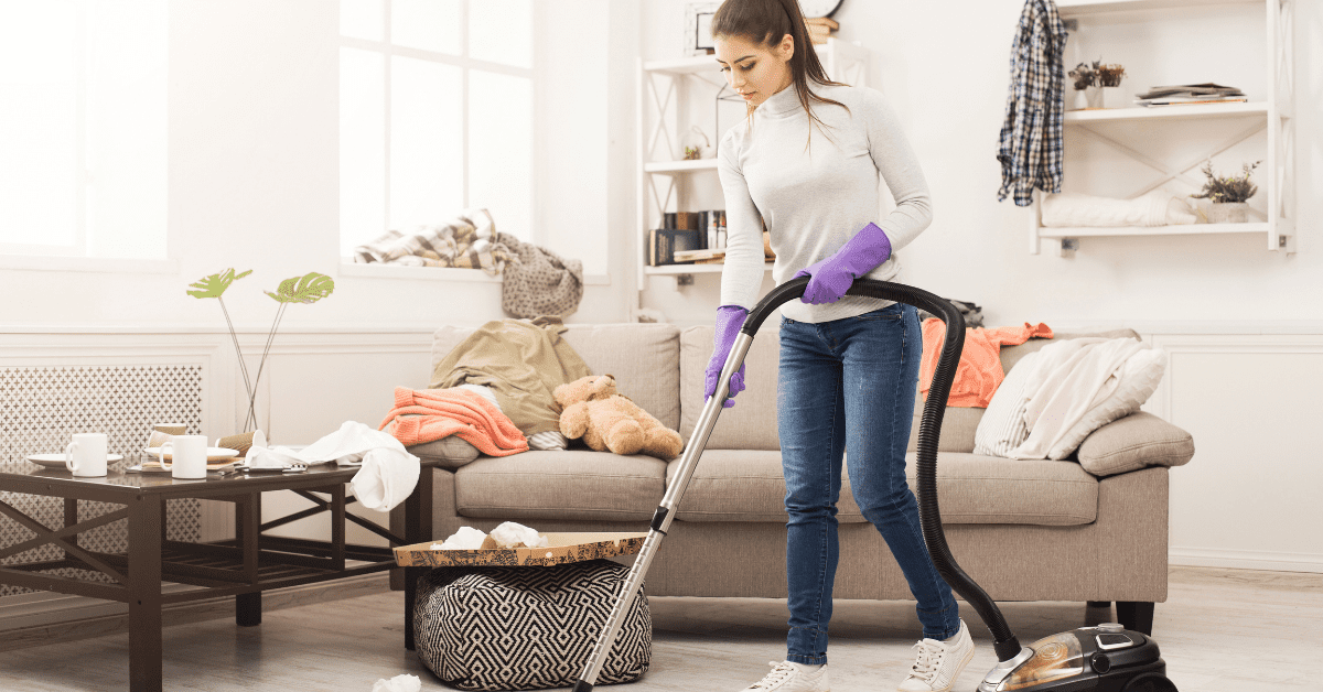 Deep cleaning - Upstairs Downstairs Cleaning Service Deep cleaning - a young lady uses a vacuum cleaner