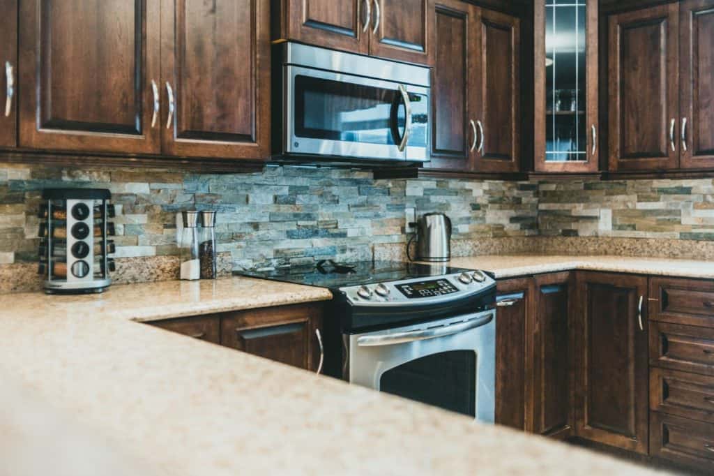 image - Upstairs Downstairs Cleaning Service Brown wood kitchen