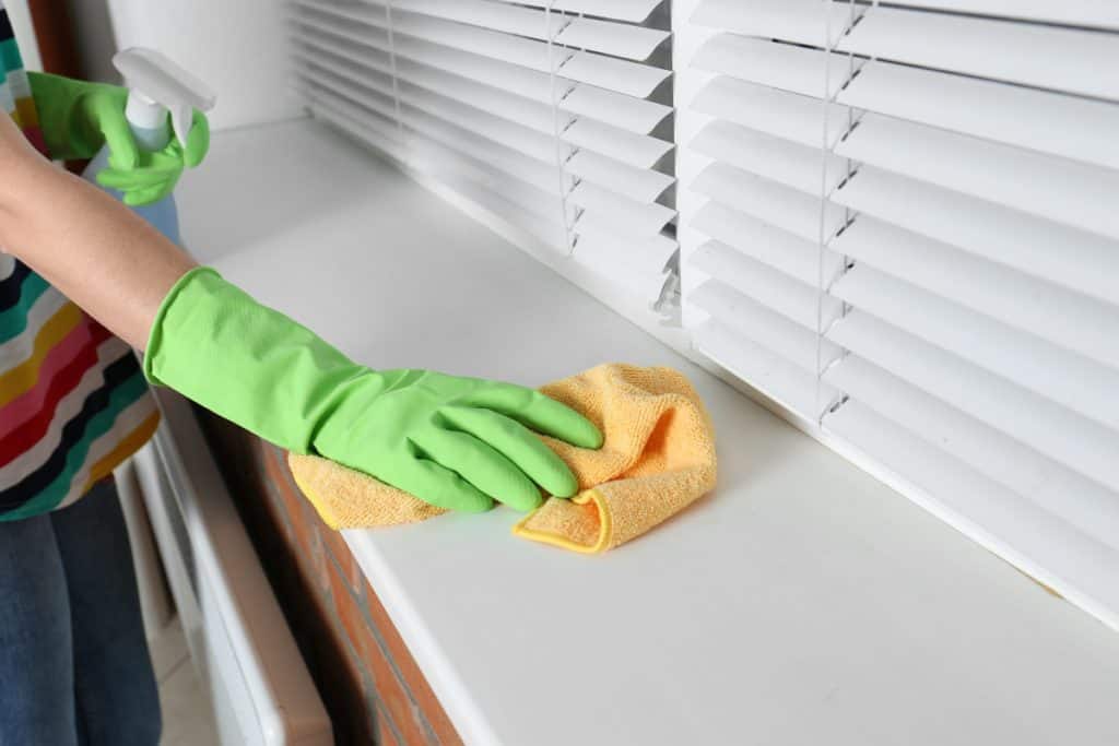 cleaning window sills - Upstairs Downstairs Cleaning Service cleaning window sills