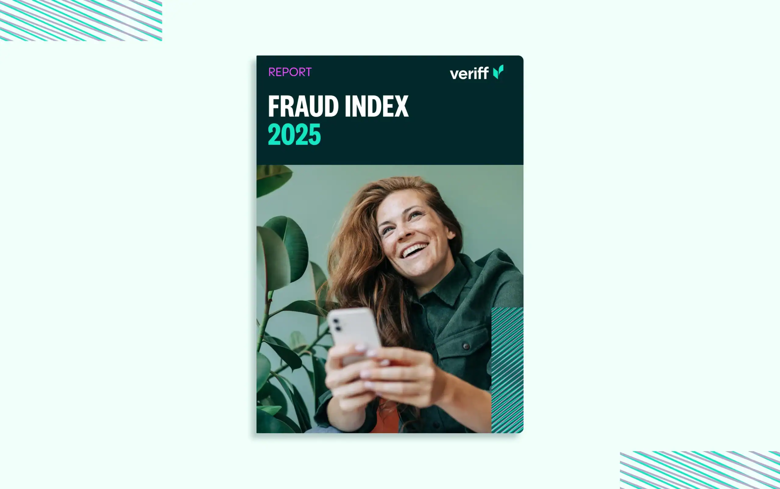 a woman smiling and holding a phone