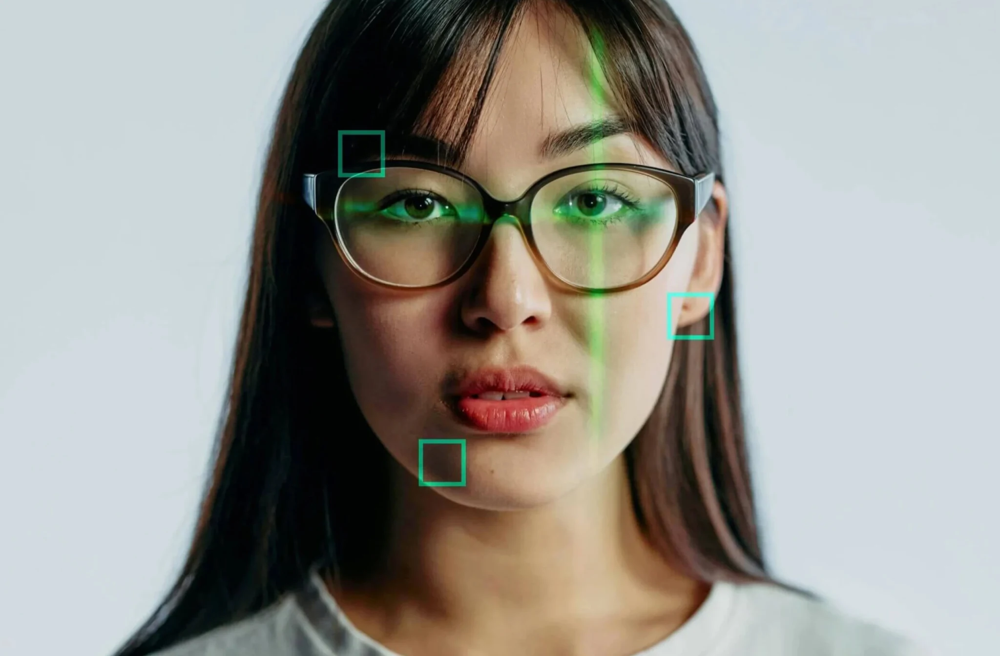 a woman with glasses and green squares