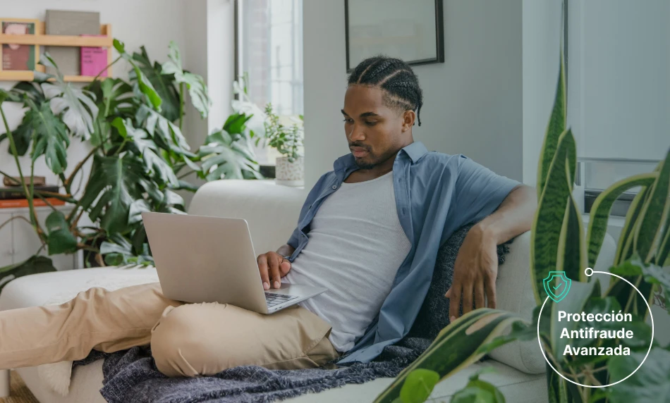 a hand holding a phone with a screen showing a picture of clothes