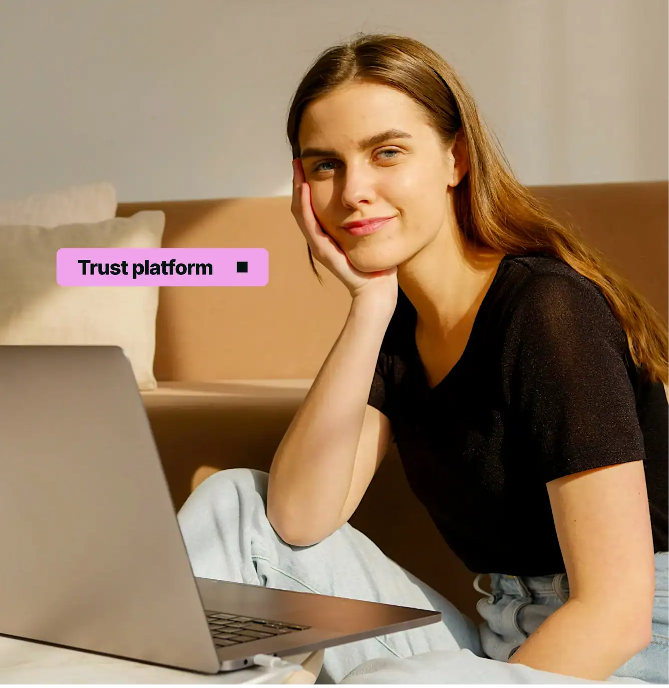 Person using laptop on couch