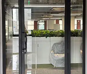 Double door and panel in fire rated wall