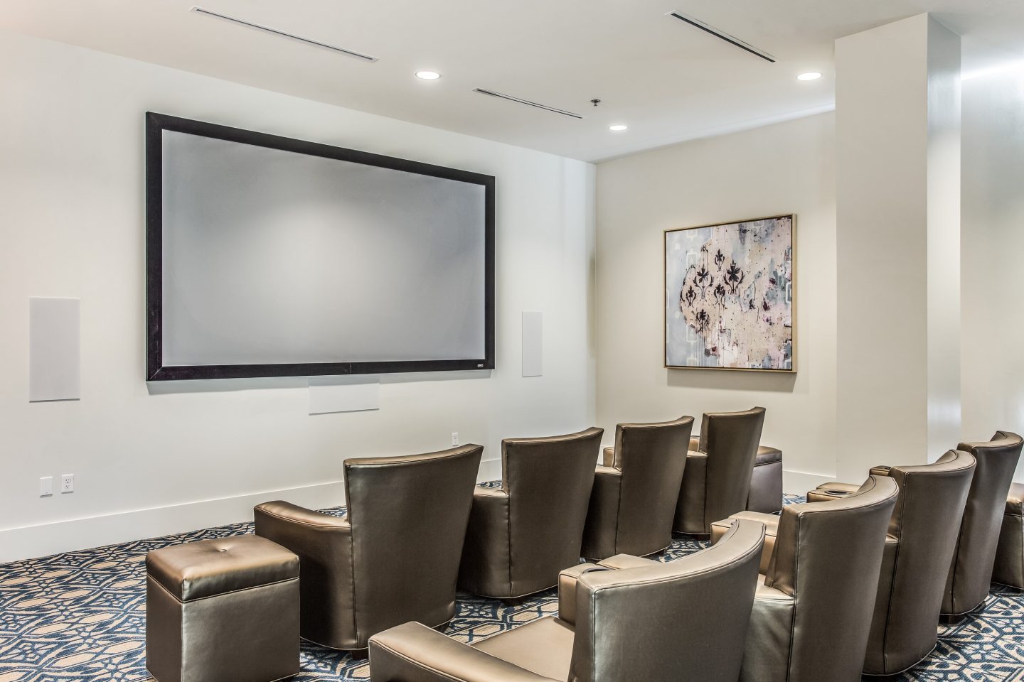 Media room with entertainment features at Glass House Dallas, Texas