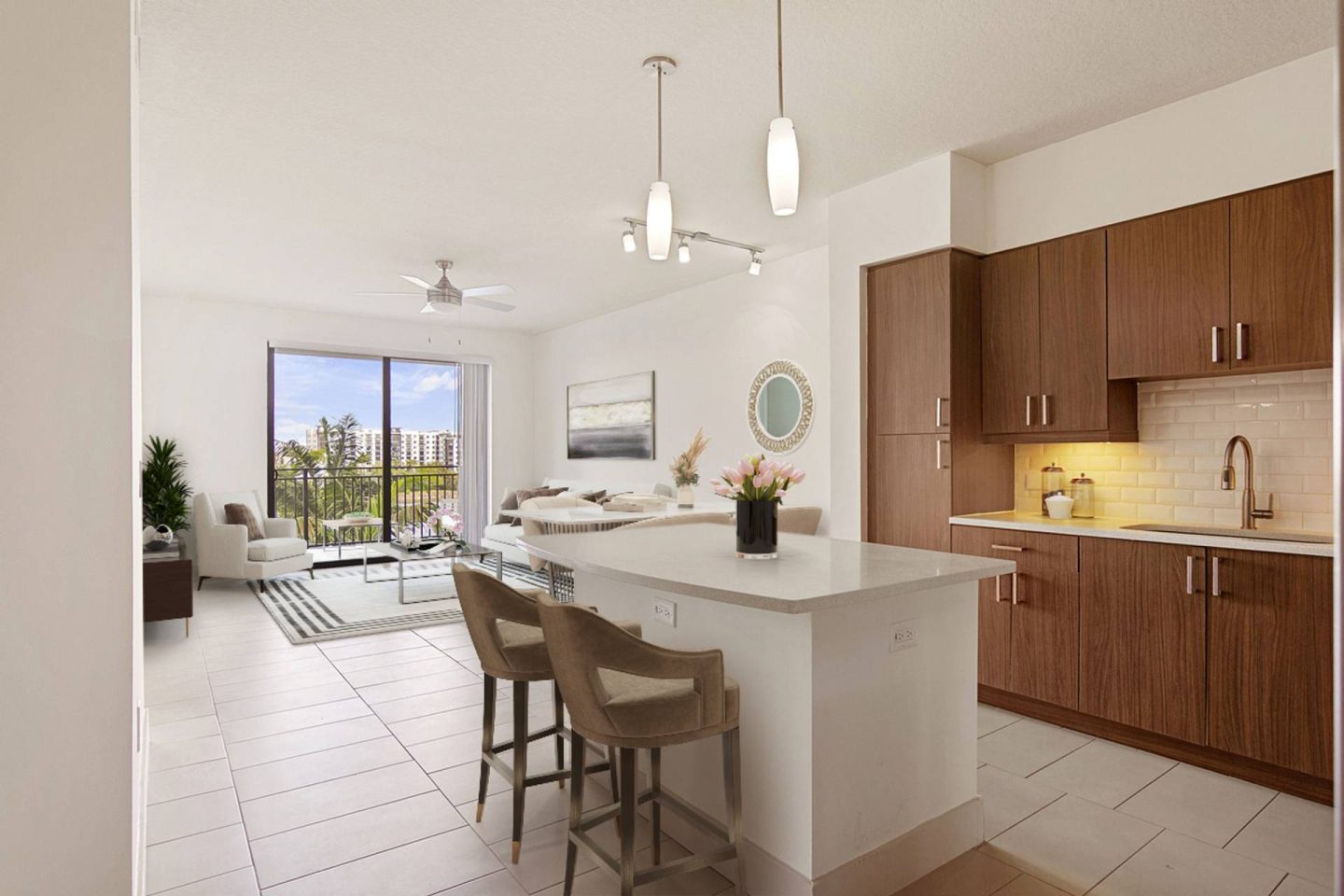 A modern kitchen with a bar area and a dining table.