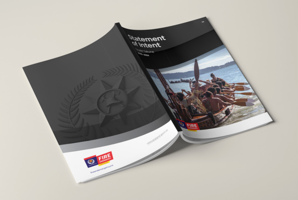 A black and white Fire and Emergency NZ brochure with a picture of a man on a boat.