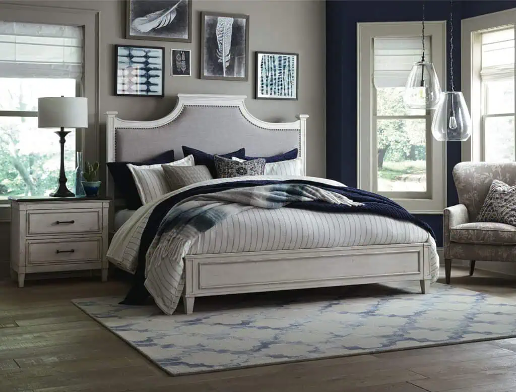 Bassett Bella bedroom set in white with upholstered headboard and bedside table