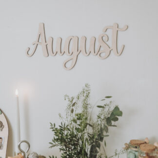 Personlig namnskylt i trä för barnrum