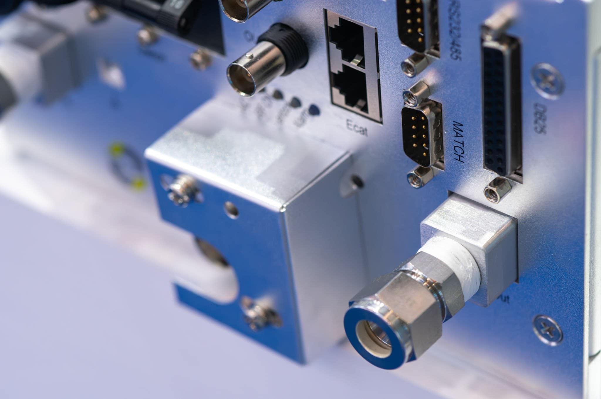 Close-up of Micro-D connectors on UAV electronic system.