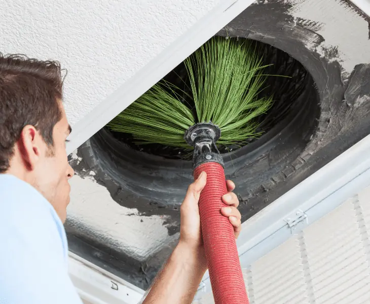 dirty air duct being cleaned