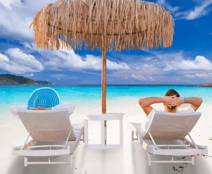 couple enjoying while on the sea shore