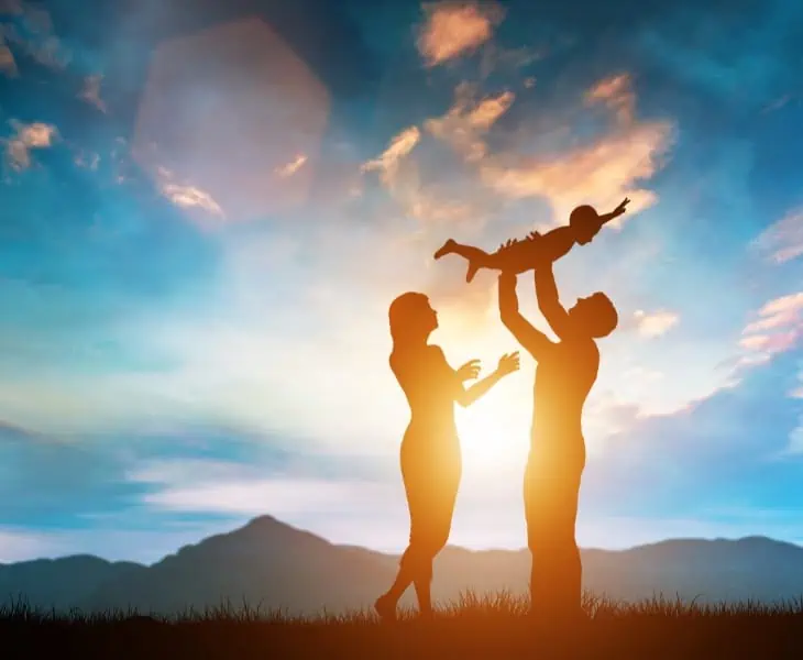 happy family in sunset