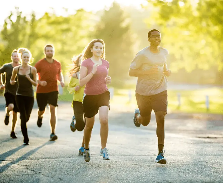 athletes running with trees around
