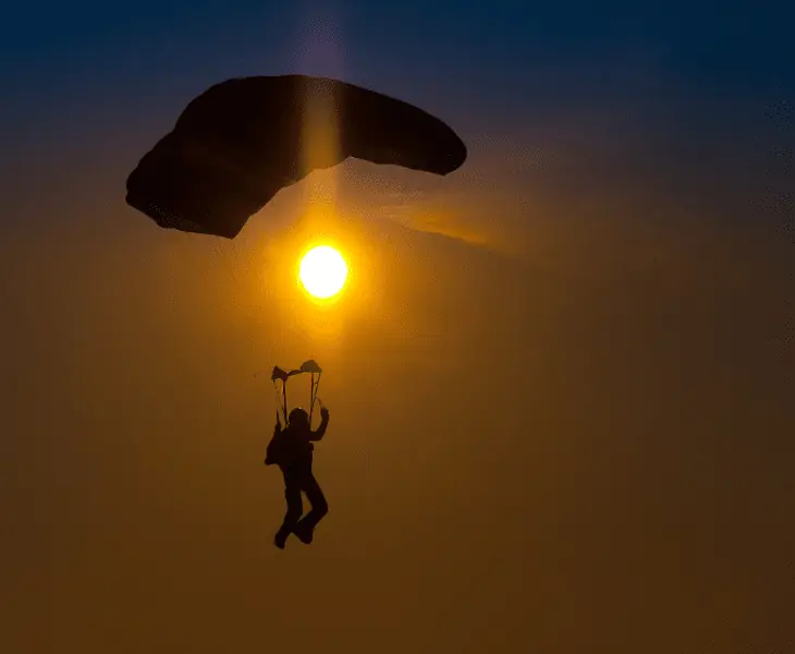 beautiful sunset and skydiver