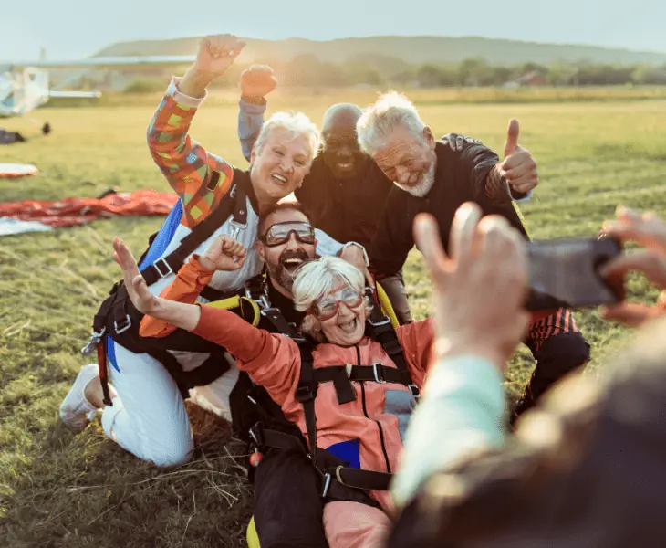 a group of seniors after skydiving