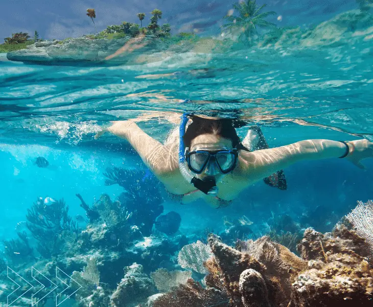 a woman doing snorkeling activity