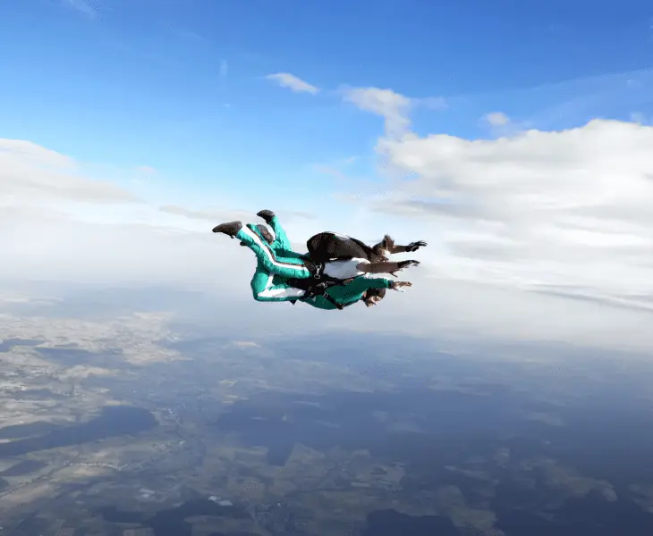 instructor and passenger skydiving