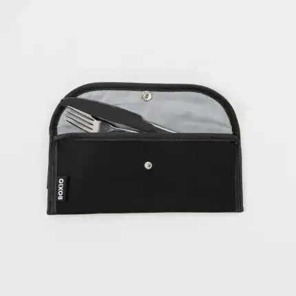 Portable black eat bag with utensils for outdoor dining and travel.
