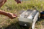 Portable Skotti Pikes camping grill for outdoor cooking and grilling.