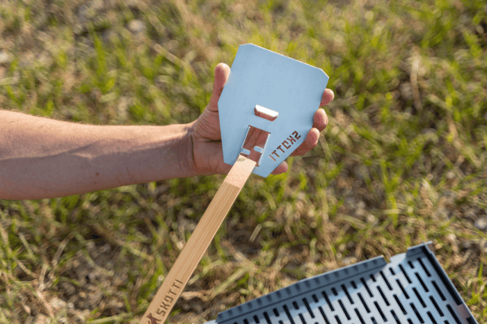 Portable Skotti Flip grill for outdoor camping and grilling.