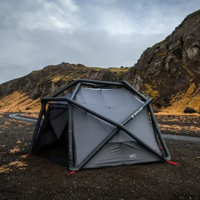 Portable Cloudbreak shelter on rugged landscape for outdoor adventures.